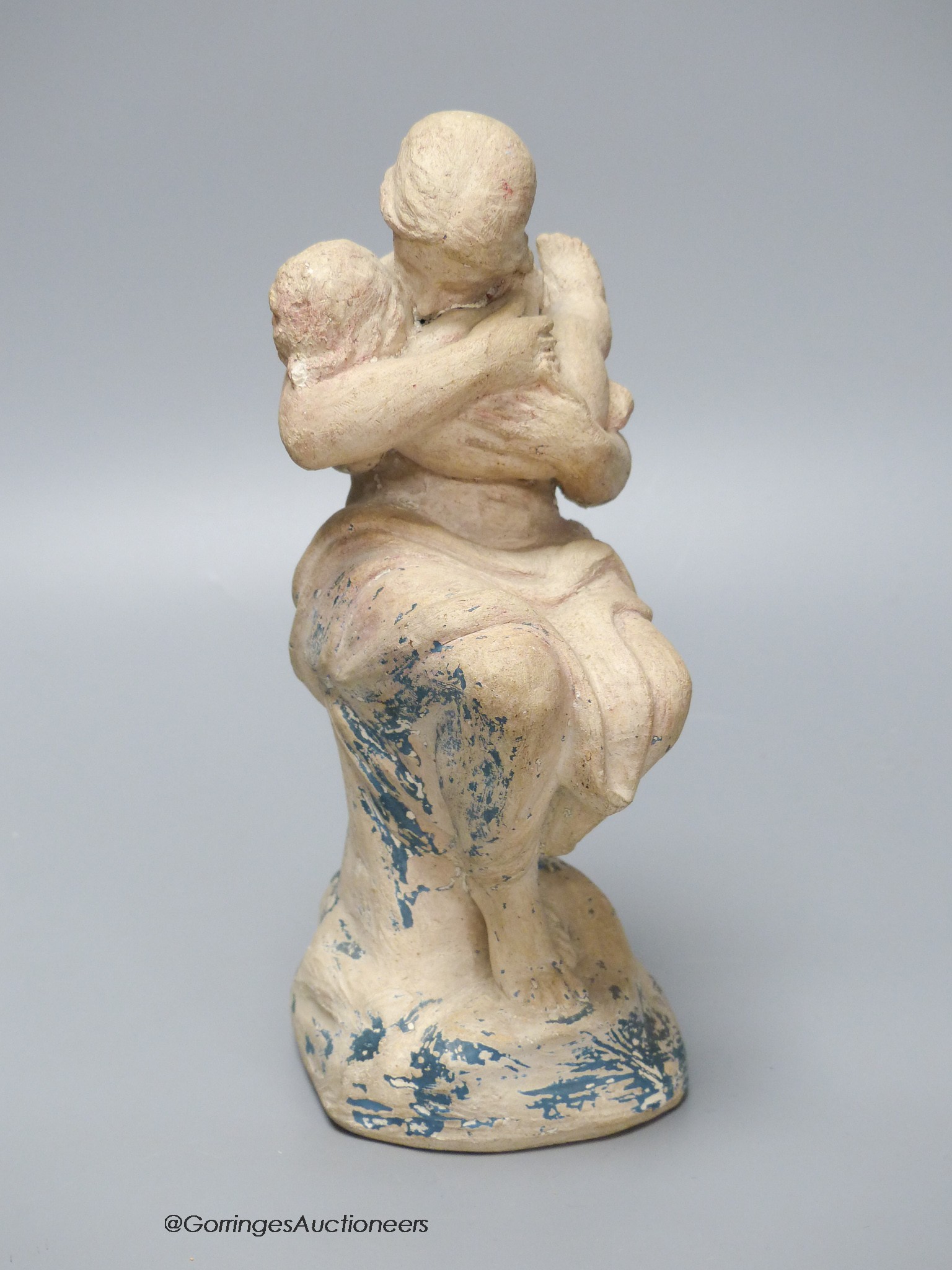 A Julian Bell terracotta figure of mother and child, with traces of original paint, base inscribed ' A Game of Romps, J. Bell ,1987', height 22cm 22cm.